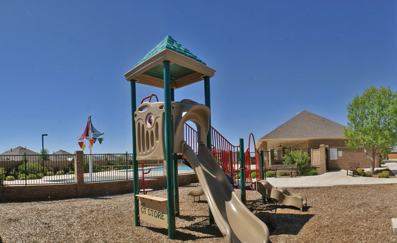 playground and park benches in heritage oaks
